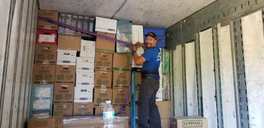 Moving Pro Inc crew packing a household move